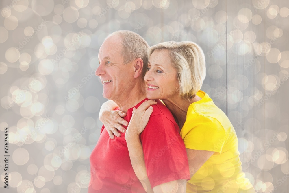 Aufkleber composite image of happy mature couple hugging and smiling