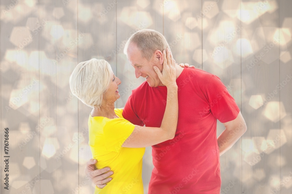 Aufkleber composite image of happy mature couple hugging and smiling
