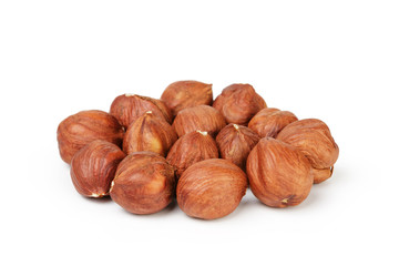 Heap of peeled hazelnuts isolated on white