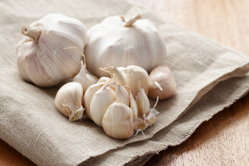 fresh organic garlic on sack cloth