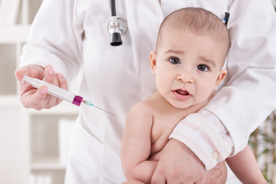 Suprised baby needs to receive vaccine