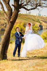 groom and the bride during walk in their wedding day