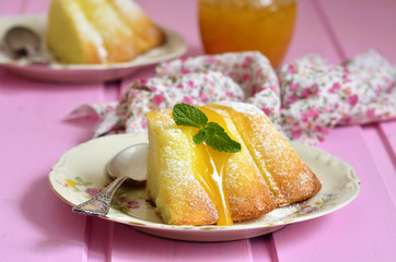 Piece of curd casserole (pudding) with honey dressing.