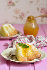 Piece of curd casserole (pudding) with honey dressing.