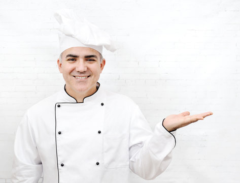 smiling chef in white uniform