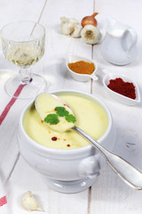 French cuisine: garlic soup and a wineglass