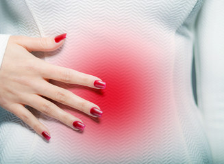 Woman having menstrual pain or stomach ache
