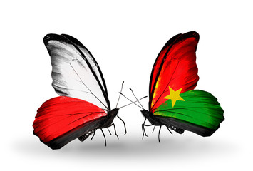 Obraz premium Two butterflies with flags Poland and Burkina Faso