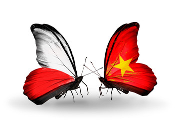 Obraz premium Two butterflies with flags Poland and Vietnam