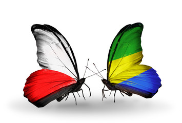Two butterflies with flags Poland and Gabon