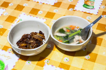 Background image of fried noodle with pork and vegetable soup