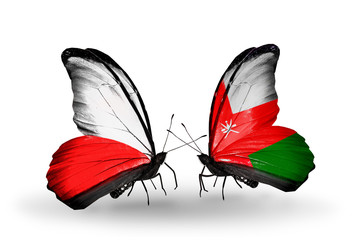 Two butterflies with flags Poland and Oman