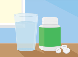 The medicine and water put on a table