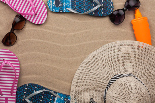 Accessories for the beach lying on the sand