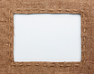 Frame of burlap, lies on a white background