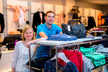 young couple in the clothes shop