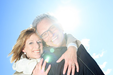 Portrait of happy senior couple in winter season