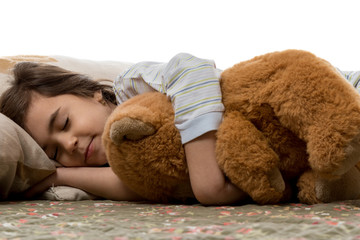 girl sleeping with teddy bear