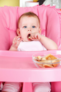 Sweet Baby Eating Biscuit