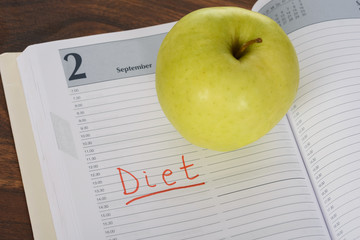Diet Word And Apple On Diary