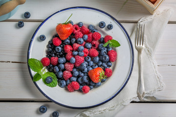 Fresh berry fruits on plate