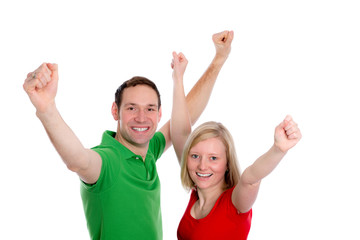 young couple with hands with arms up