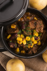 Tasty winter traditional hot pot stew with meat and vegetables