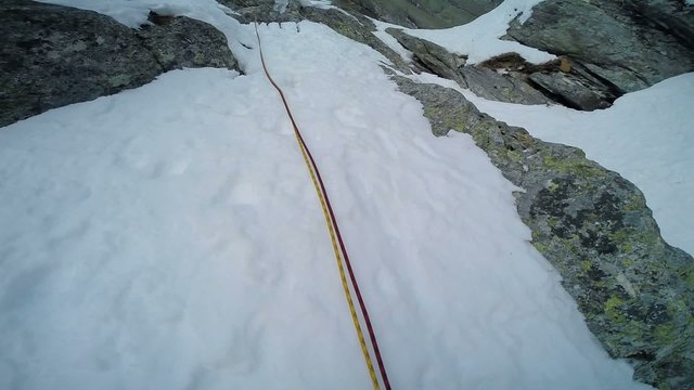 Ice climbing on a route of snow and rock