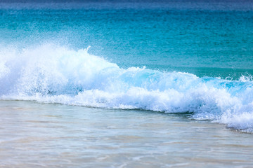Wave of the sea on the sand beach