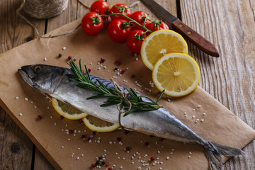 raw mackerel with lemon tomatoes and rosemary