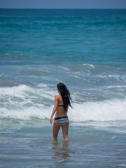 Woman on the beach in Bali Kuta