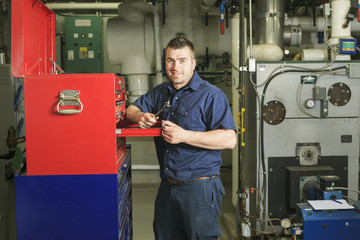 industrial technician inside a industrial place