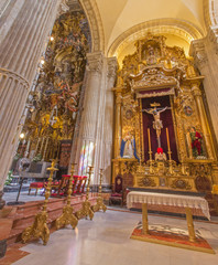 Fototapeta na wymiar Seville - The side altar in baroque Church of El Salvador