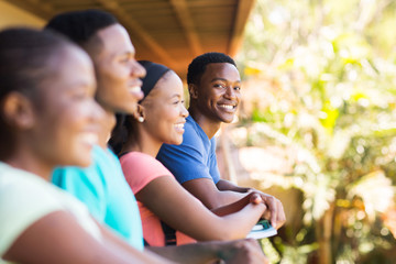 young african college boy with friends