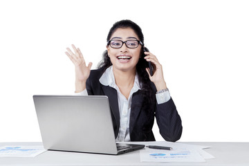 Happy manager talking on the phone