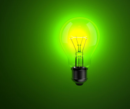 Light bulb on green background.