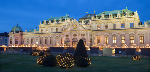 Fototapeta premium Vienna - Belvedere palace at the christmas market in dusk