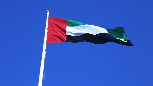 Flag of the United Arab Emirates and blue sky