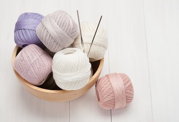 Thread Bobbins in a Wooden Bowl