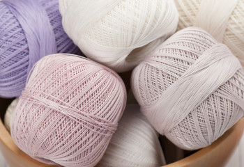 Thread Bobbins in a Wooden Bowl