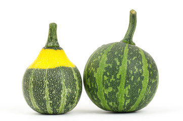 Raw pumpkins on white background