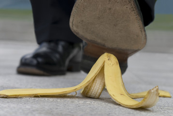 Businessman and banana skin © david_franklin