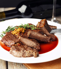 Steak with wine sauce