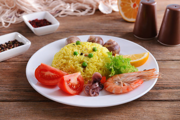 Seafood Paella on plate on table close-up