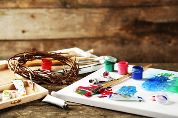 Professional art materials on wooden background