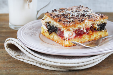 Homemade pie with jam and glass of milk