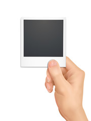 3d hand holding a photo
