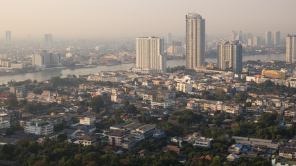 Bangkok residence area with Chao Phraya river in the background