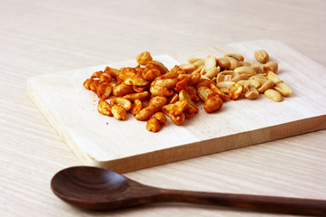 Thai Spicy flavour nuts with wooden spoon