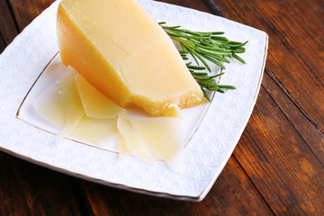 Parmesan cheese with sprig of rosemary